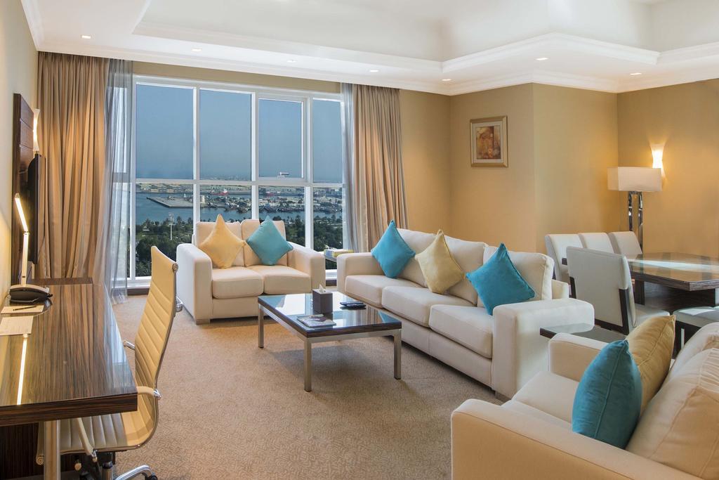 잔나 버즈 알 사라브 호텔 아부다비 외부 사진 A living room in a suite at the Jumeirah Beach Hotel